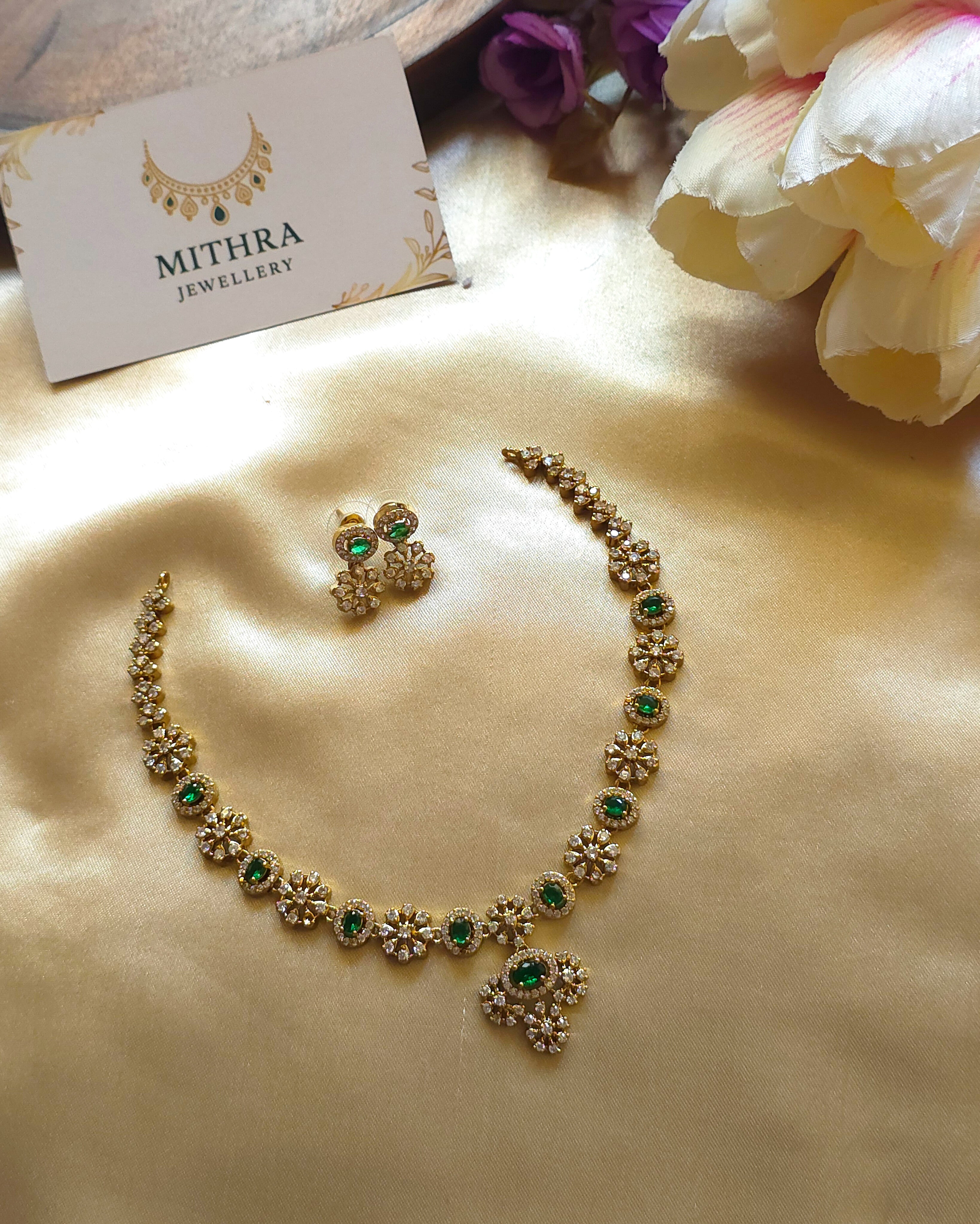 Elegant AD Stone Floral Necklace with Emerald Green Accents